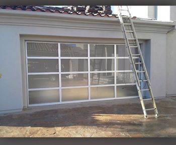 Glass and Aluminum Door by Trinity Garage Door Service
